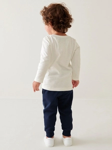 Classic white long-sleeved t-shirt and navy blue jogger pants set for young boys