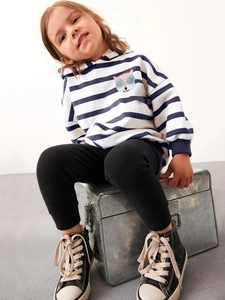 Ensemble fille avec sweat à capuche rayé et pantalon de jogging noir côtelé