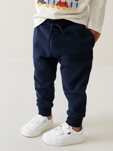 Boys navy blue cotton joggers with drawstring waist and rib cuffs in a casual look