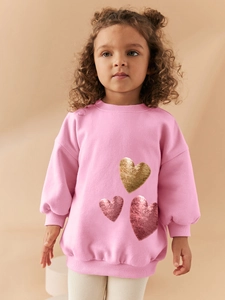 Pink long sleeve sweatshirt for girls with three sequin heart patterns on soft knit fabric
