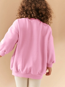 Pink long-sleeve heart print girls' sweatshirt with drop shoulder and ribbed cuffs