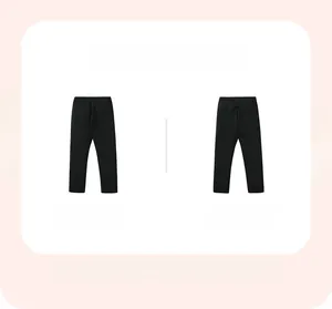 Detail view of black girls' leggings with elastic waistband and high-stretch fabric