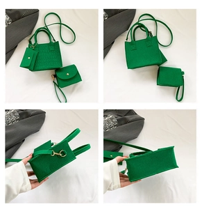 Detalles del set de bolsos de fieltro verde con textura de cocodrilo y cierres dorados