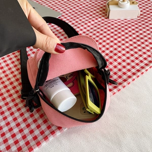 Piccola borsa a tracolla in tela rosa per donna con cinghie e zip nere opache