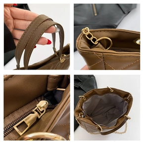 Détails du cabas matelassé marron montrant les zips dorés, coutures et doublure interne