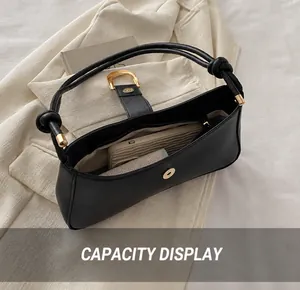 Internal view of black leather hobo bag showing large capacity for daily essentials
