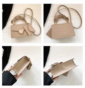 Detailed views of beige embossed small square bag with pleated handle and mini pouch
