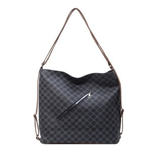 Chic tote bag with grey geometric pattern and brown leather straps on white background