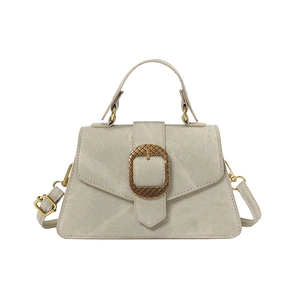 Light gray canvas shoulder bag with a stylish vintage buckle for a classic fashion look