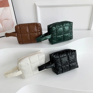Quilted puffer tote bags in four colors with puffy lattice design and top handles
