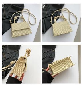Detail view of woven straw crossbody bag with knotted handle and spacious interior