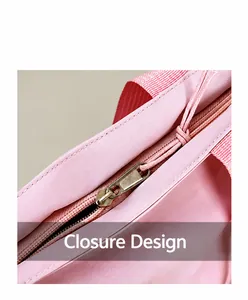 Detail der rosa Canvas-Einkaufstasche mit sicherem Metallreißverschluss und Webgriffen