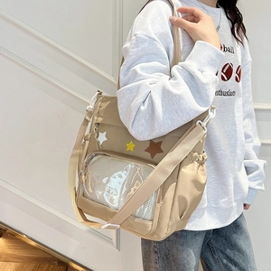 Sac fourre-tout en toile kaki style japonais avec écussons étoiles et poche en PVC