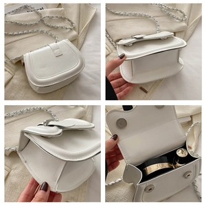Detailed views of a mini white leather saddle bag with chain strap and magnetic closure