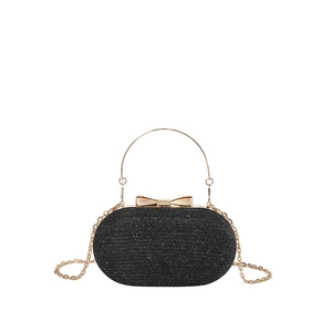 Elegant black glitter evening bag with gold metal handle and bow clasp for parties