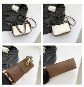 Detailansicht der zweifarbigen Umhängetasche mit Goldkette und Rich Rabbit Logo