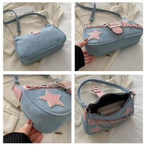 Dettagli della borsa ascellare in denim con stelle, fibbia argentata e spazio interno