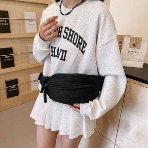 Detail of black mesh waist bag with breathable fabric and woven zipper pullers