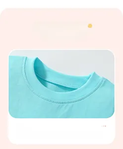 Detail shot of the light blue cotton crew neck with flatlock seam stitching craftsmanship