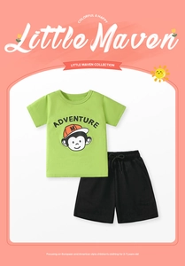 Détail du t-shirt vert en coton avec singe cartoon et short noir pour garçons 2-7 ans