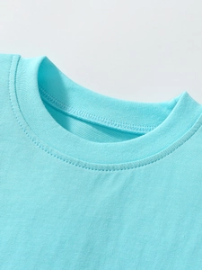 Close-up of sky blue cotton dress neckline with reinforced stitching for toddler girls