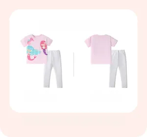 Detail of pink cotton t-shirt with mermaid print and grey pants summer set for girls