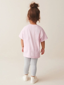 Pink short sleeve t-shirt and grey leggings set for girls, viewed from behind