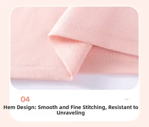 Detailed view of the delicate double-stitched hem on this pink cotton girls' T-shirt