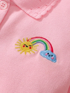 Abito polo rosa da bambina in cotone con ricamo arcobaleno e trama piqué morbida