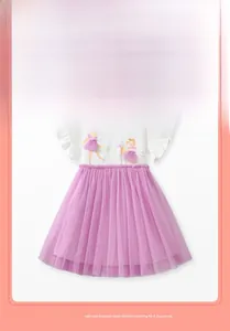 Close-up of cotton bodice with fairy print and layered purple mesh tulle skirt detail