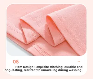 Dettaglio dell'orlo del vestito in cotone rosa con cuciture precise e finitura resistente