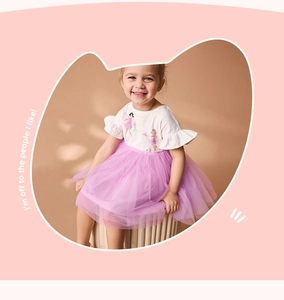 Close-up of girls' summer dress featuring fairy print, ruffle sleeves and pink tutu skirt