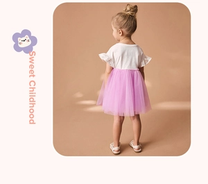 Detail of girls' dress featuring pink tulle skirt, ruffle sleeves, and back view design