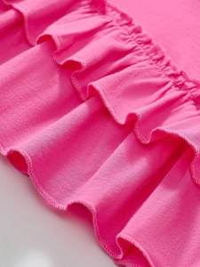 Cute pink cotton dress for girls with ribbed knit fabric and ruffle hem details