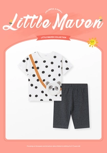 Detail of girls' cotton set featuring panda plush pocket and printed crossbody strap