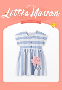 Detail of blue striped cotton girls dress with wooden buttons and flower patch