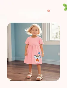 Detail of pink polka dot cotton dress featuring cute mouse embroidery and mesh accents