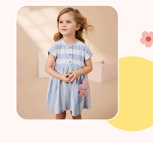 Detail of girls' cotton striped dress featuring wooden buttons and pink flower pocket