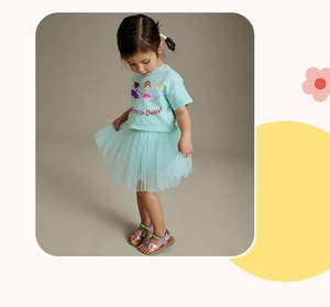 Detail of girls' light blue summer set with ballet dancers and mesh tutu skirt