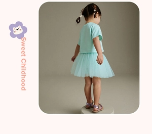 Back view of mint green toddler girls' cotton t-shirt and layered tulle tutu skirt set