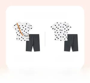 Front and back view of girls summer cotton panda set with polka dot tee and shorts
