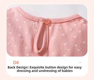 Detail of pink cotton girl dress showing back neckline with star print and button closure