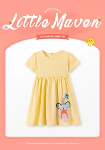 Detail of yellow cotton dress for girls with 3D mouse embroidery and white polka dots