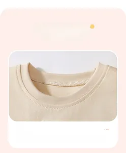Detail showing the ribbed neckline and precise reinforced stitching on children t-shirt