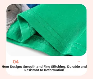 Close-up of double-stitched hem on green cotton girls' summer knit cartoon dress