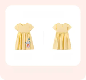 Flat lay of yellow girls' cotton dot dress showing both front and back koala patch details