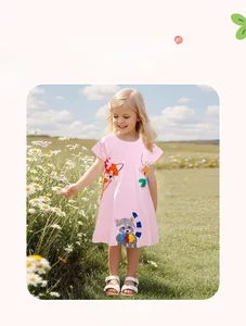 Detail of girls light pink summer dress featuring cute forest animal cartoon embroidery