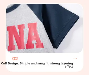 Detail of raglan sleeves with reinforced double-needle stitching on boys' cotton T-shirt