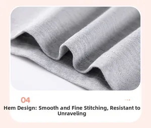 Detailed close-up of double-needle stitching on the grey cotton t-shirt bottom hem
