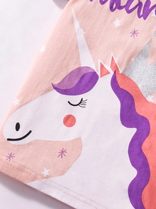 Camiseta rosa de algodón para niña con estampado de unicornio brillante y borla morada